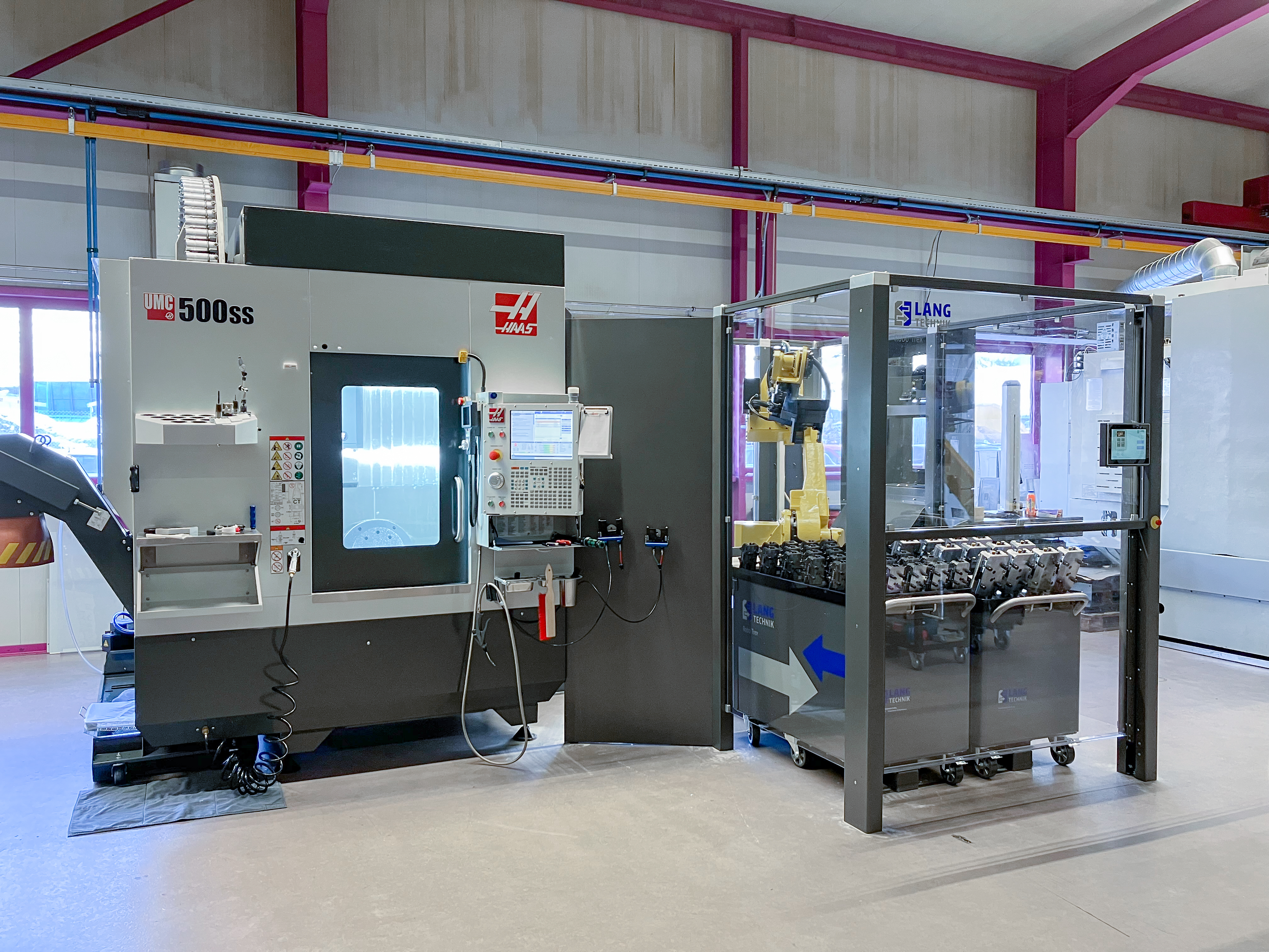 Haas UMC 500ss with RoboTrex automation