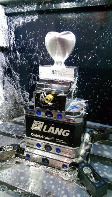 5-axis vise held securely in a zero point clamping system from LANG Technik